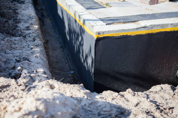 Professional Basement Waterproofing technician working in Brazil, IN